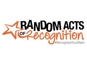 Orange colored star with a text "RANDOM ACTS OF Recognition"